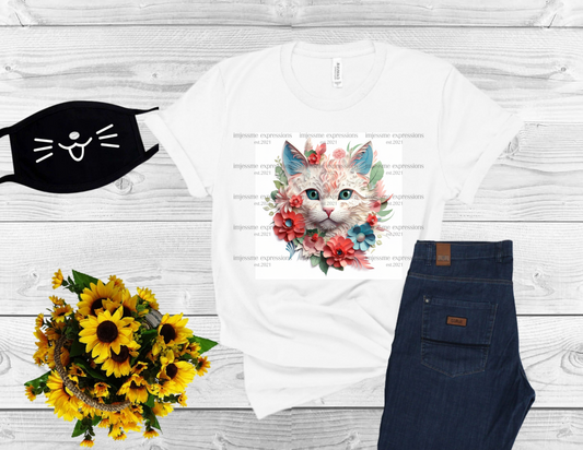 image of a white short sleeve tee, with a 3d image with flowers and a cat